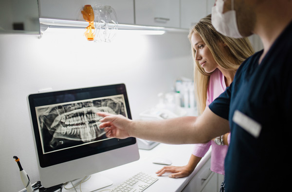 Dentist reviewing a digital x-ray at Myers Park Dental Partners in Charlotte, NC